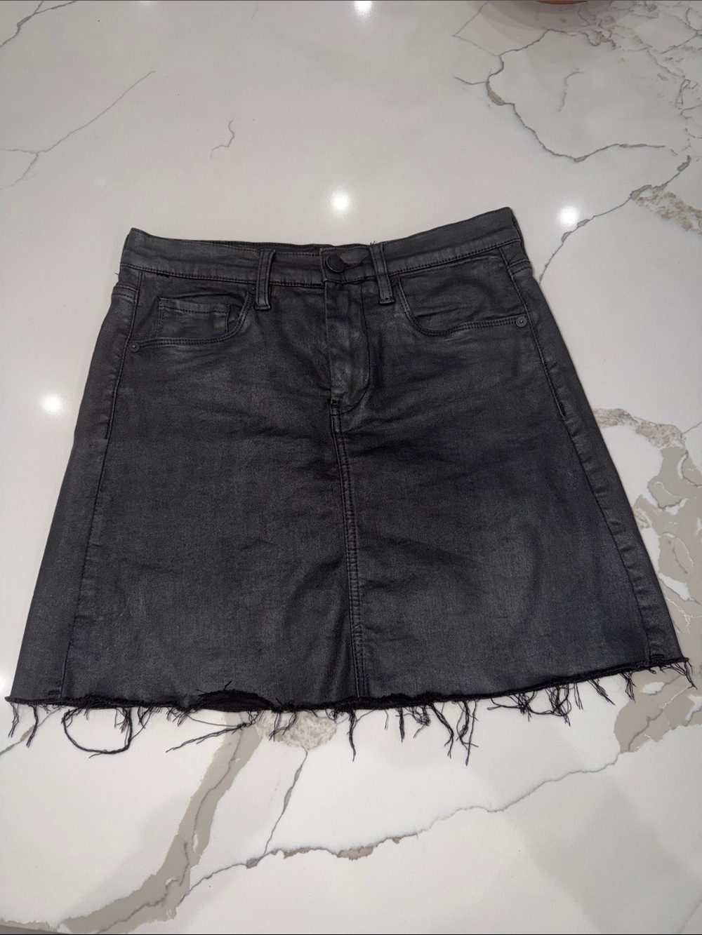 Blank NYC Black Washed Denim Mini Skirt with Raw Hem